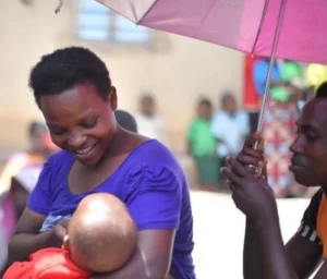 a mother who is breastfeeding her baby 1